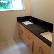 After bathroom remodel in Holly-Seabeck home with custom vanity and double sink