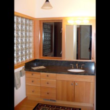 Bathroom remodel with custom cabinetry and finishes in Indianola waterfront home