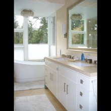 Bathroom remodel with custom double vanity and freestanding bathtub overlooking water, Sun Day Cove, Bainbridge Island